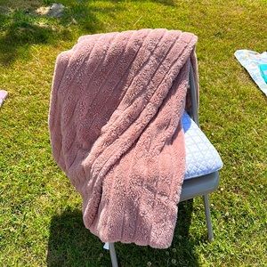 Pink faux fur throw
